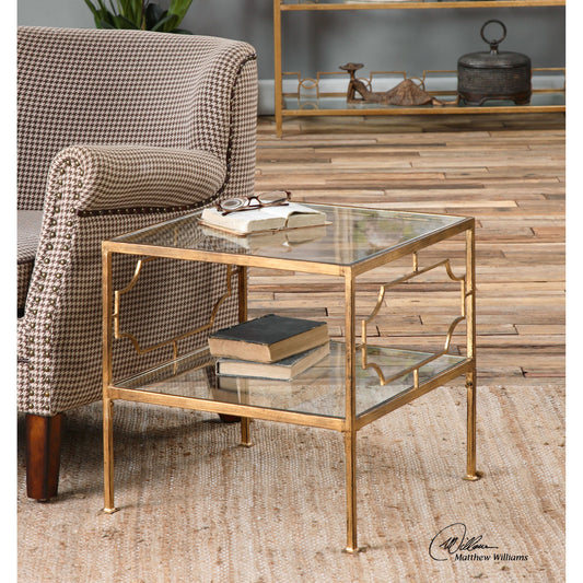 Genell Cube Table by Uttermost in gold. Made from metal, tempered glass in a modern style.