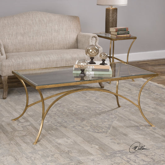 Alayna Coffee Table by Uttermost in gold. Made from metal, glass in a modern style.