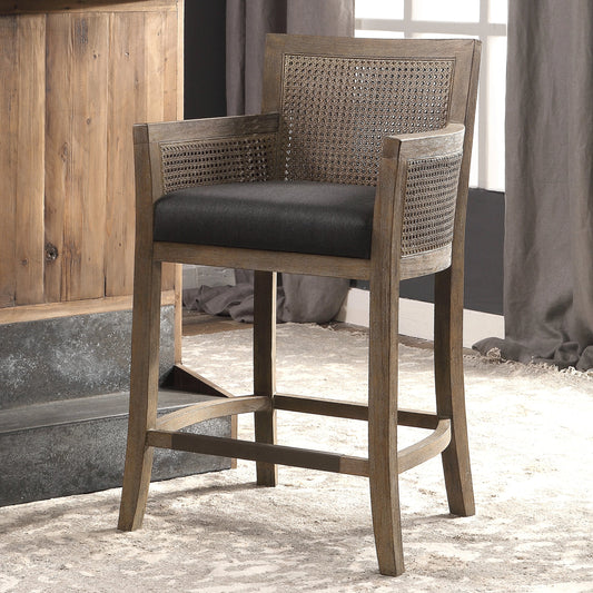 Encore Counter Stool by Uttermost in dark gray. Made from birch wood, plywood, fabic, metal, foam in a transitional style.