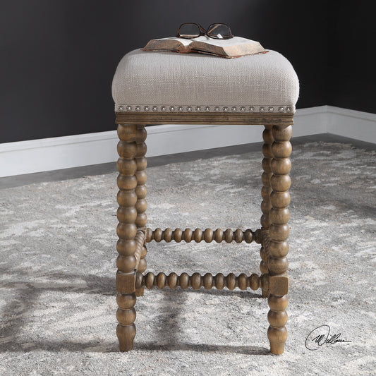 Pryce Wooden Counter Stool by Uttermost. Made from rubber wood, plywood, fabric, foam in a cottage & farmhouse style.
