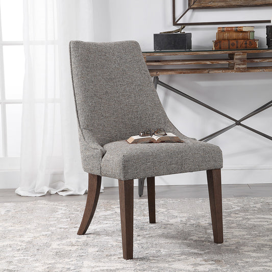 Daxton Earth Tone Armless Chair by Uttermost. Made from birch solid, plywood, fabric, foam in a transitional style.
