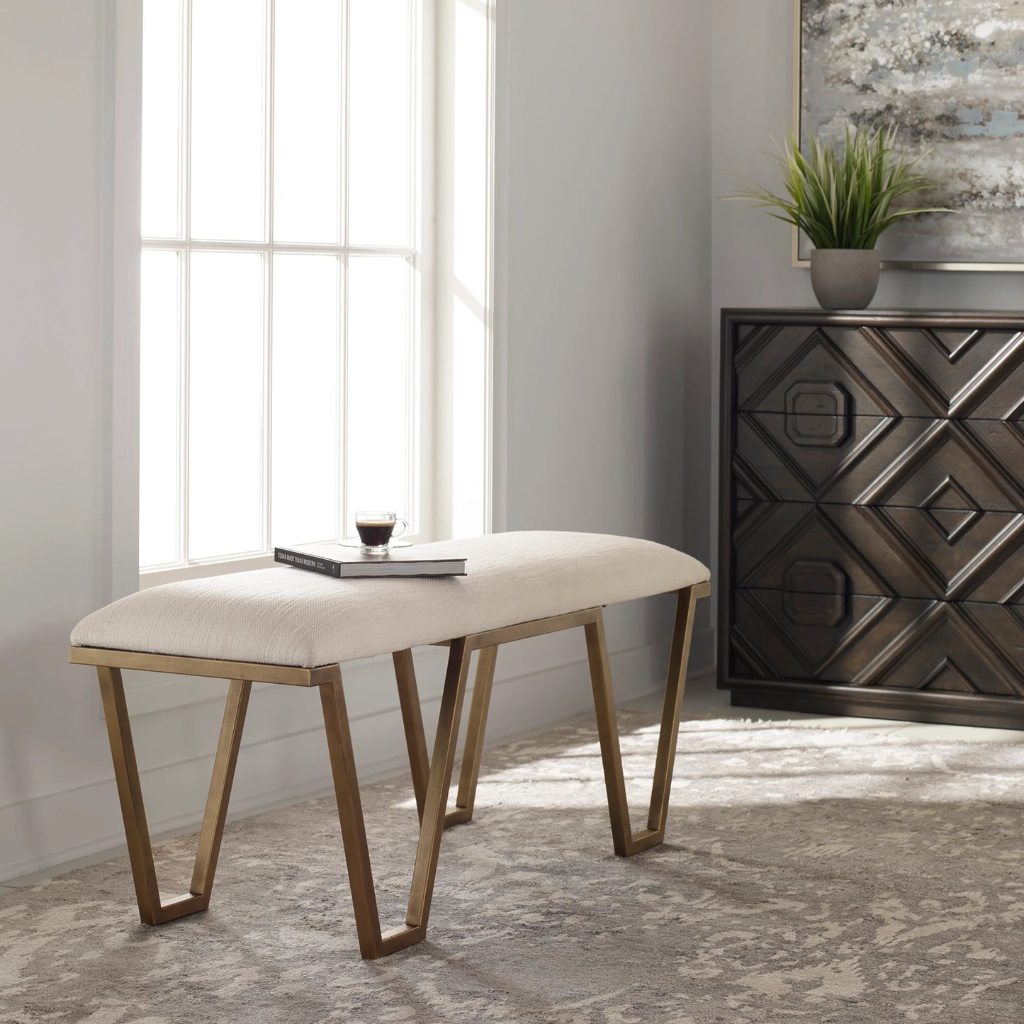 007 SI-1789777 | Lifestyle | Farrah Bench by Uttermost in antique gold leaf. Made from iron, mdf, polyester, foam in a modern style.