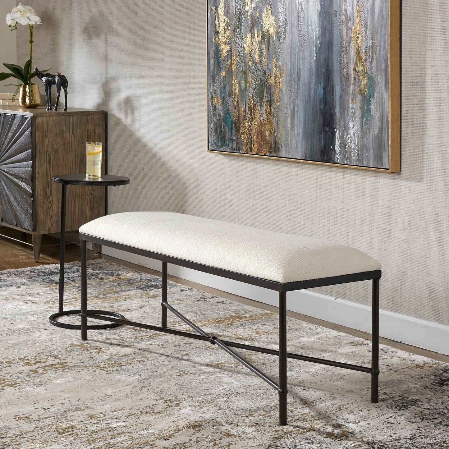 005 SI-1923674 | Lifestyle | Avenham Bench by Uttermost in satin black. Made from foam, fabric, mdf, iron in a coastal style.