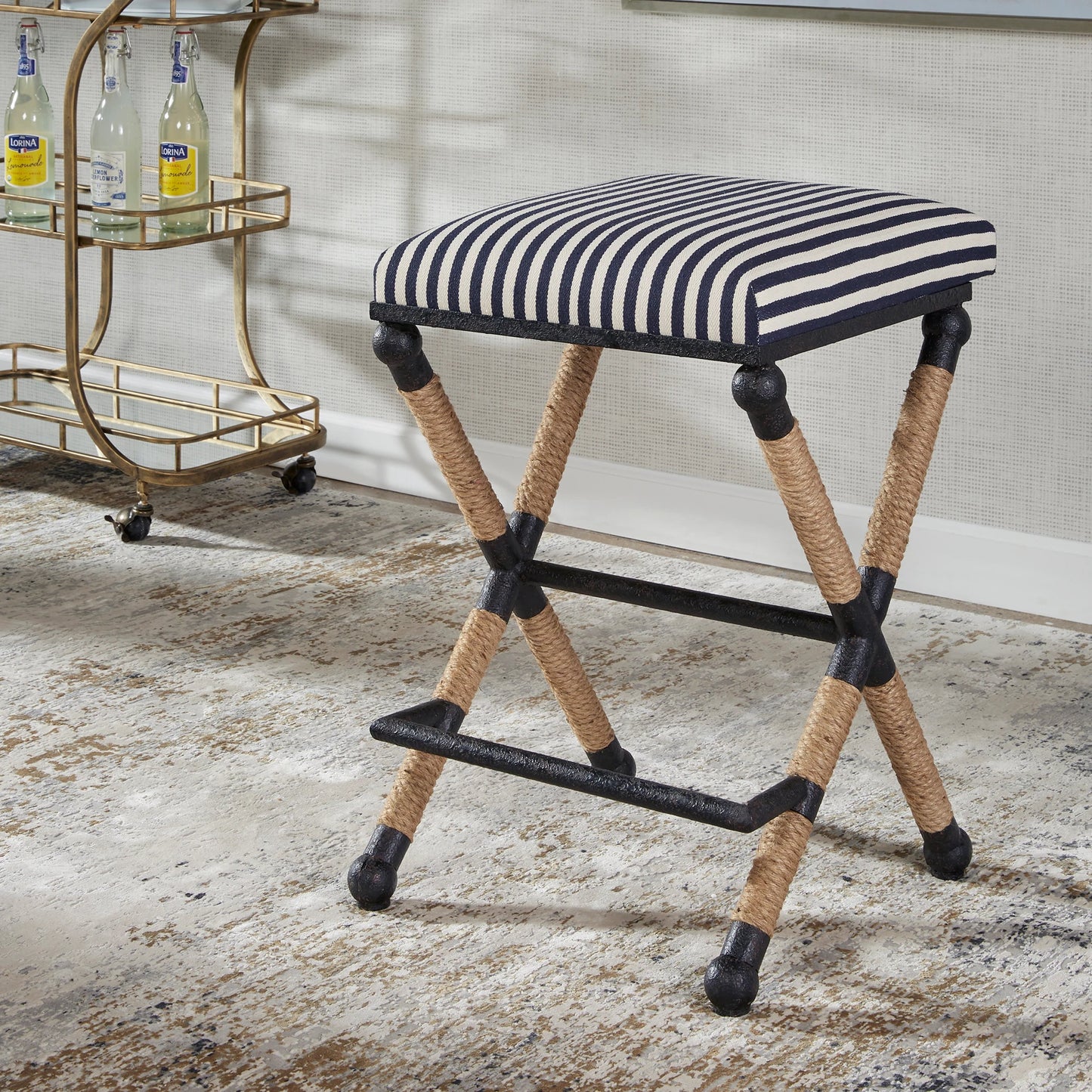 012 SI-1923688 | Lifestyle | Braddock Counter Stool by Uttermost in navy, cream and iron. Made from mdf, farbic, iron, foam, rope in a coastal style.