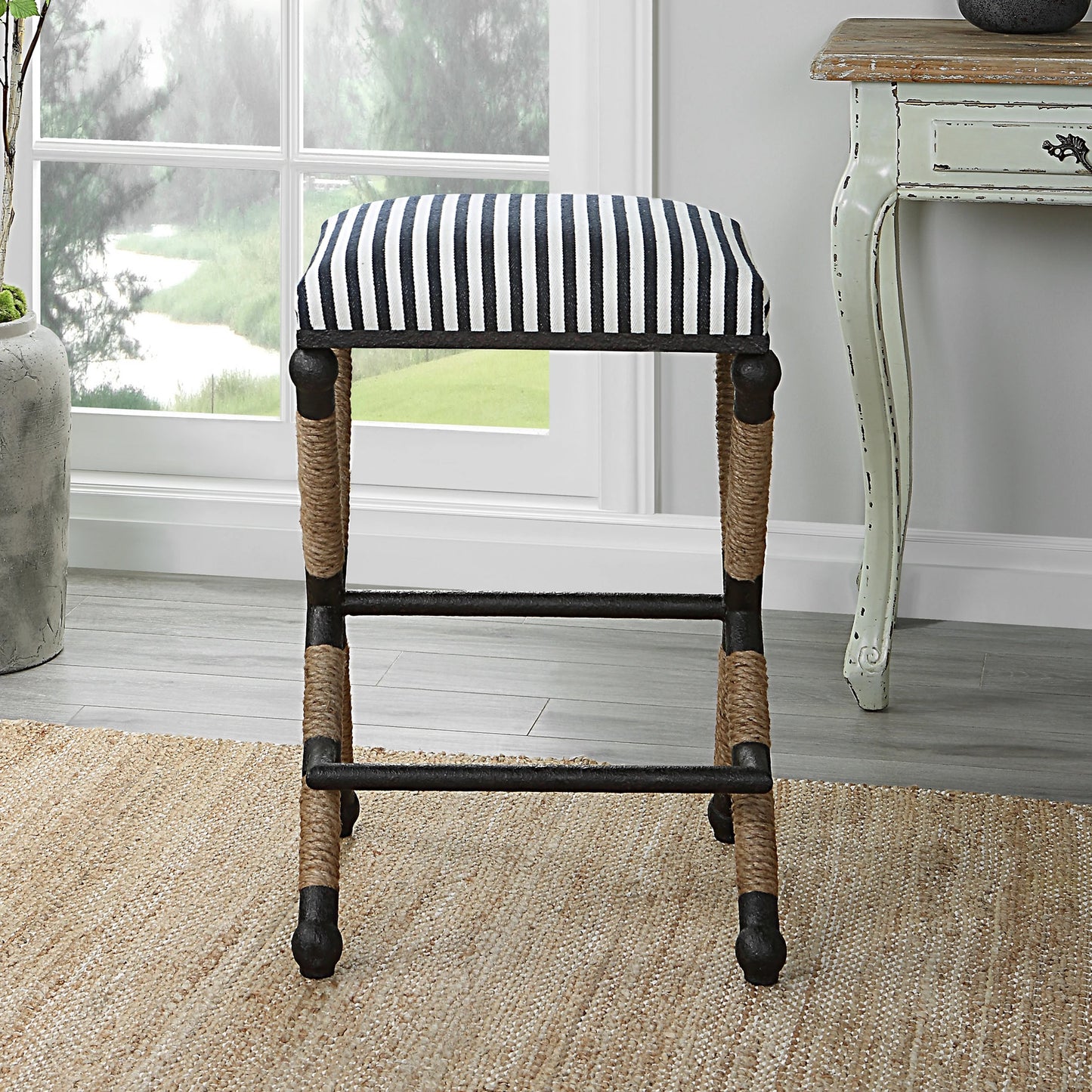 003 SI-1923688 | Additional Silo | Braddock Counter Stool by Uttermost in navy, cream and iron. Made from mdf, farbic, iron, foam, rope in a coastal style.