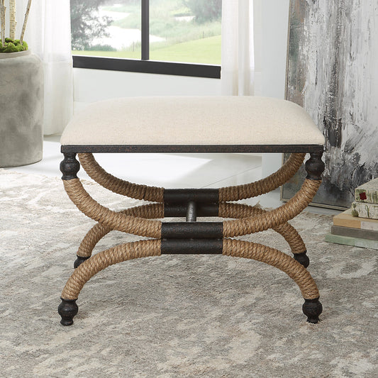 Icaria Bench by Uttermost in oatmeal and iron. Made from foam, mdf, fabric, iron, rope in a coastal style.