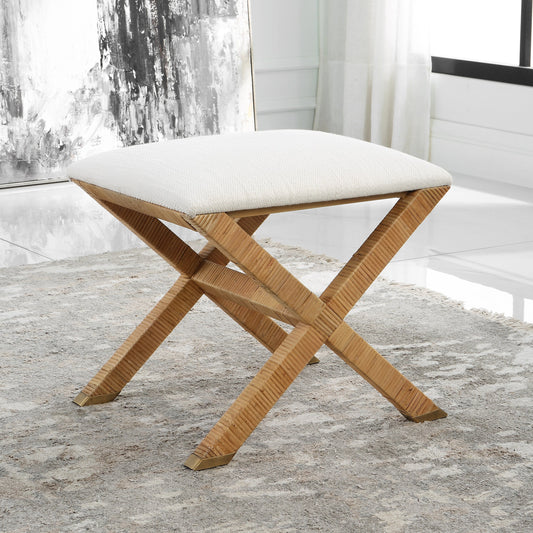 St. Tropez Bench by Uttermost in white and natural rattan. Made from iron, fir, rattan, foam, fabric, mdf in a coastal style.