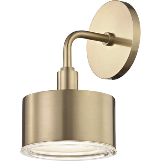 Nora Wall Sconce by Mitzi in aged brass. Made from steel in a modern style.
