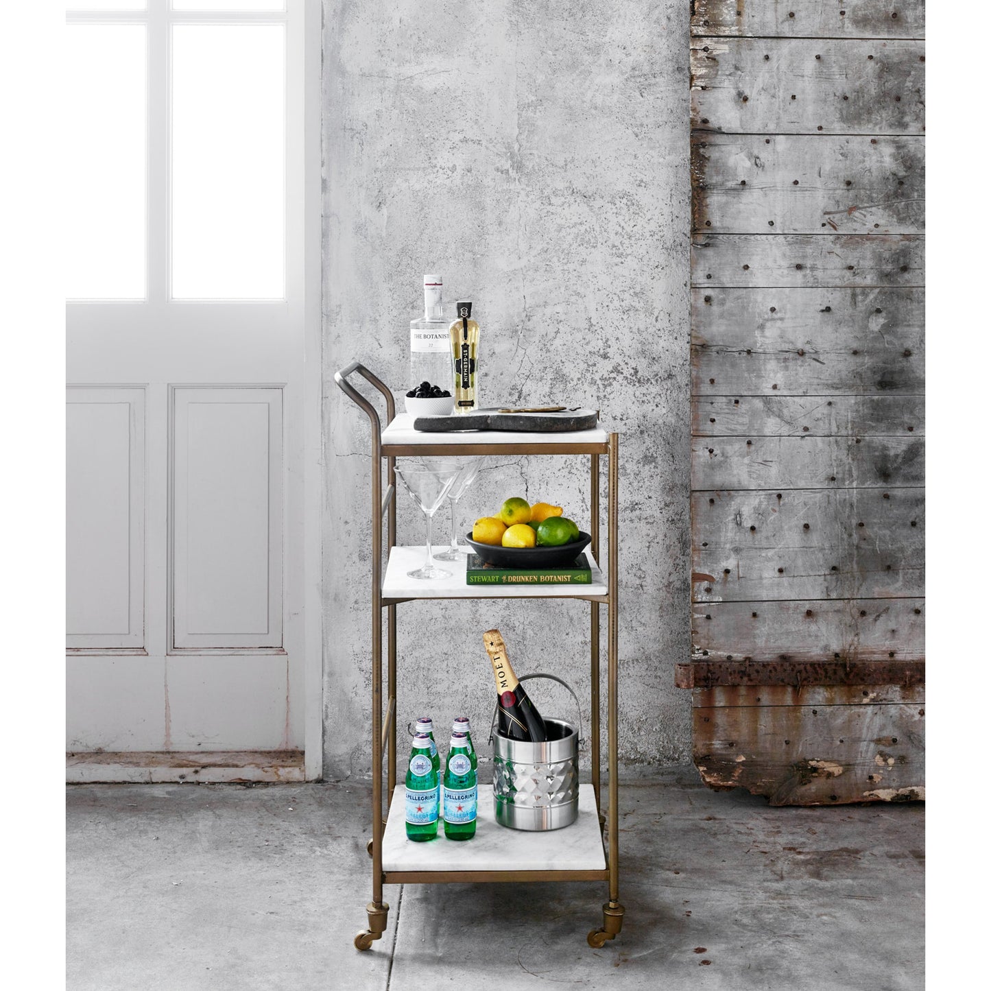 017 SR-369003 | Lifestyle | Felix Bar Cart by Four Hands. Made from iron, solid marble in a transitional style.