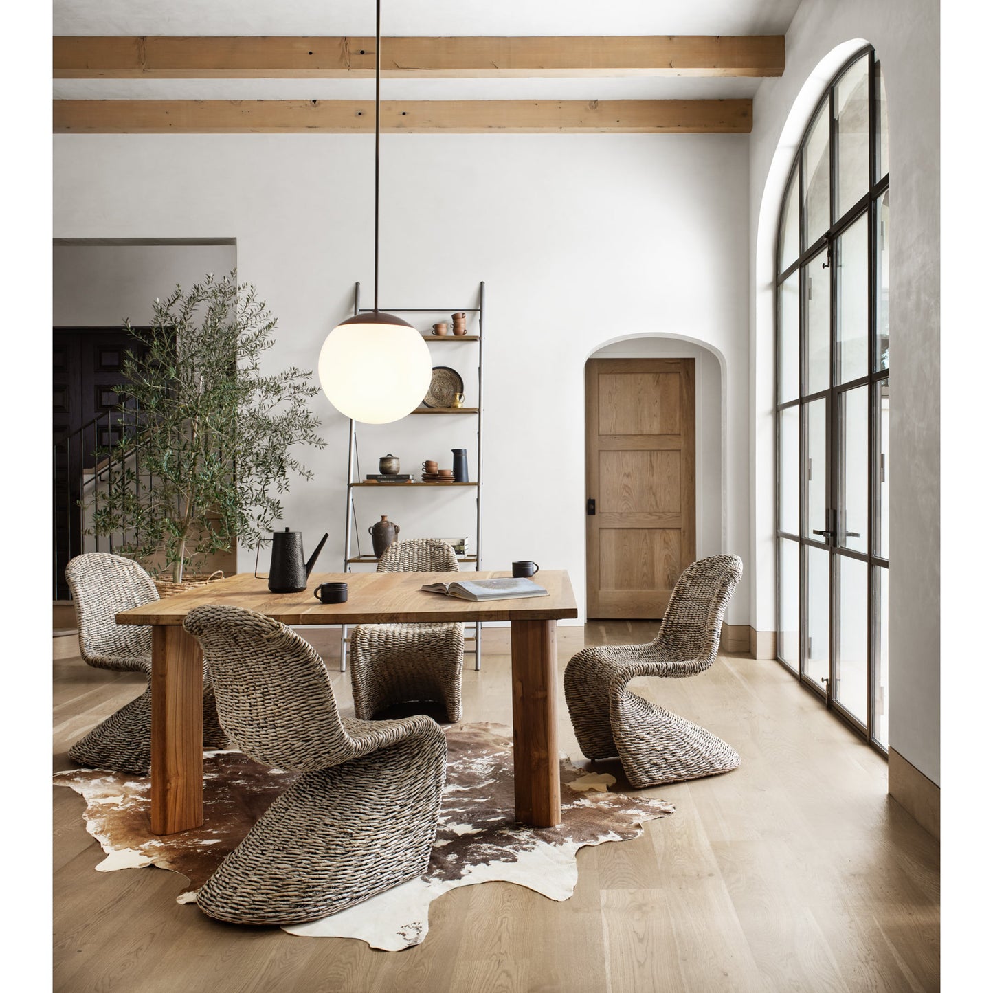 010 SR-809988 | Lifestyle | Portia Dining Chair by Four Hands in gray wash. Made from banana leaf, iron in a modern style.