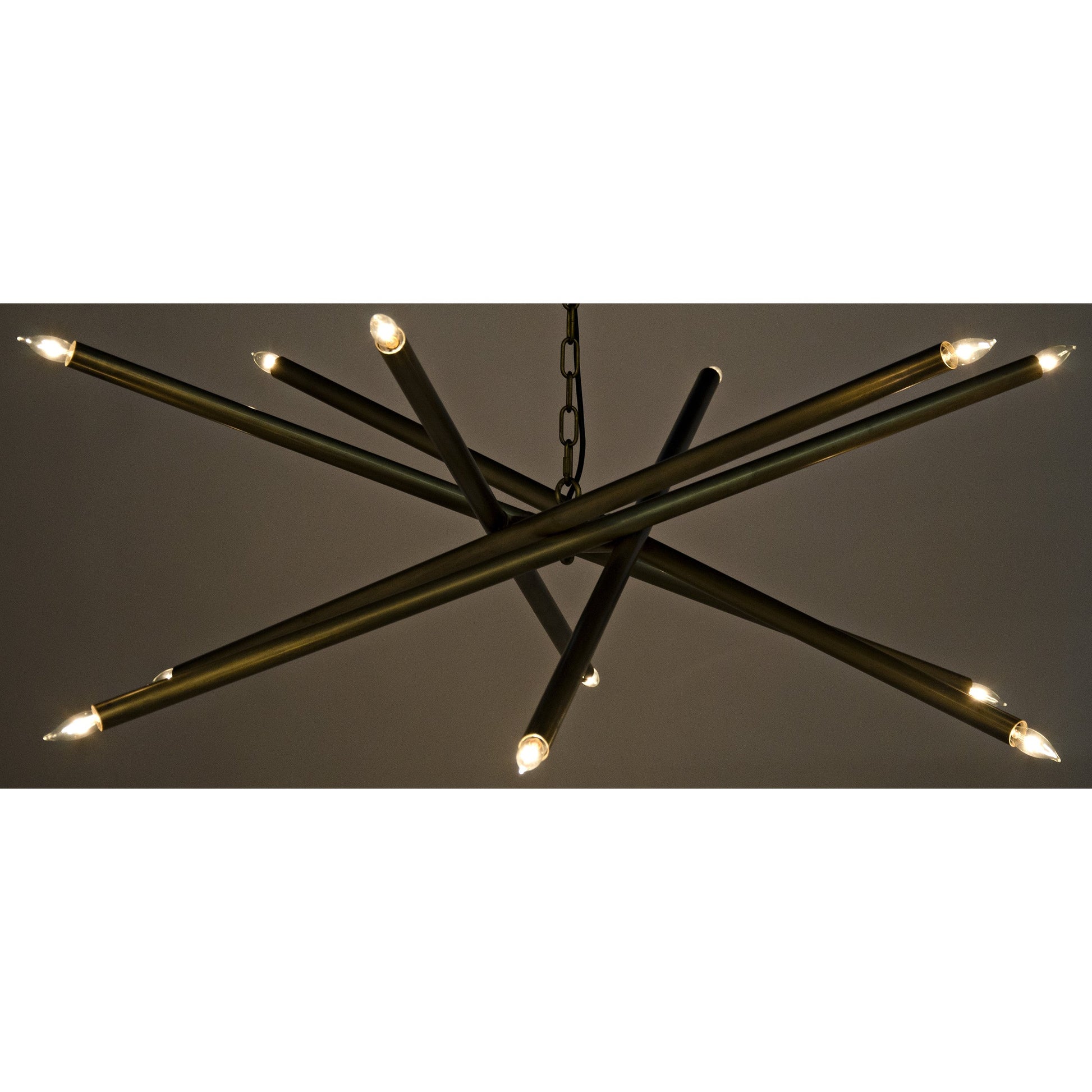 Ikram Chandelier by Noir in antique brass. Made from metal in a modern style.
