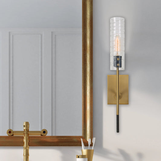 Telesto Sconce by Uttermost in brass. Made from glass, steel in a modern style.