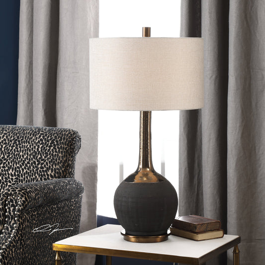 Arnav Lamp by Uttermost in black. Made from steel, ceramic in a modern style.