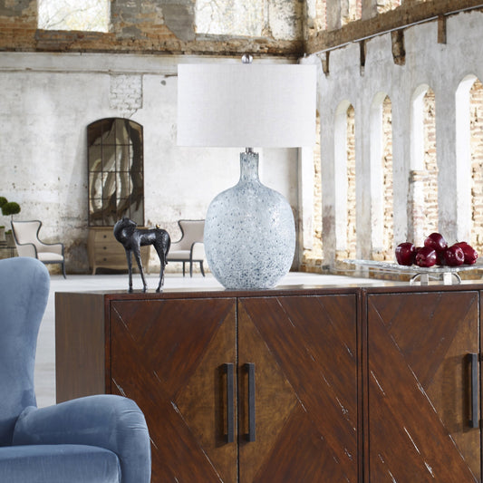 Oceaonna Glass Table Lamp by Uttermost. Made from glass, fabric, iron in a modern style.