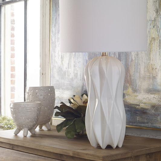 Malena Table Lamp by Uttermost in white. Made from ceramic, steel, fabric in a modern style.
