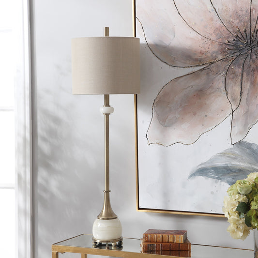Natania Buffet Lamp by Uttermost in brass. Made from steel, marble, linen in a transitional style.