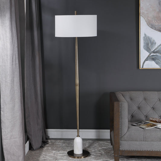 Minette Floor Lamp by Uttermost in antique brass. Made from steel, marble, fabric in a modern style.