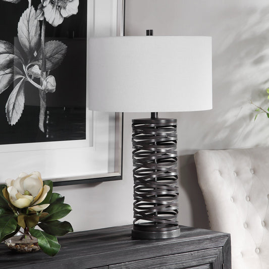 Alita Table Lamp by Uttermost in rust black. Made from steel, fabric in a modern style.