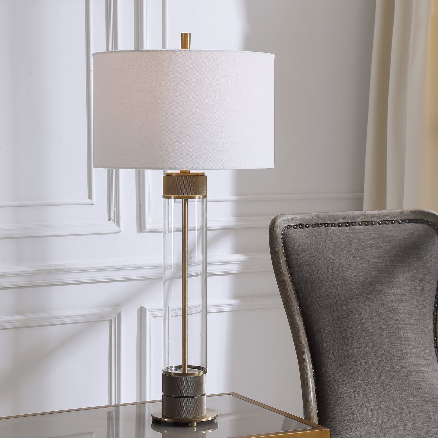 002 SR-861015 | Lifestyle | Anmer Table Lamp by Uttermost. Made from iron, glass, fabric in a modern style.