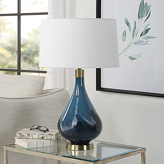 Riviera Lamp by Uttermost in sapphire, dark blue and brass. Made from steel, glass, fabirc in a modern style.