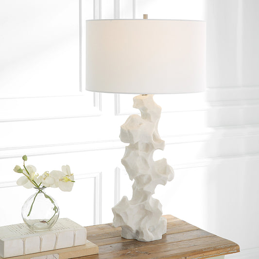 Remnant Table Lamp by Uttermost in white. Made from man-made stone, iron, fabric in a modern style.