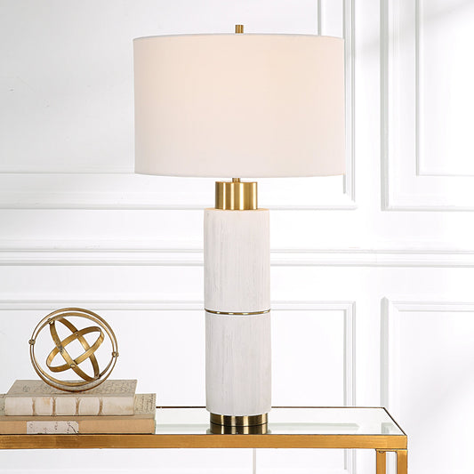 Ruse Table Lamp by Uttermost in whitewash, brushed brass. Made from resin, iron, fabric in a modern style.