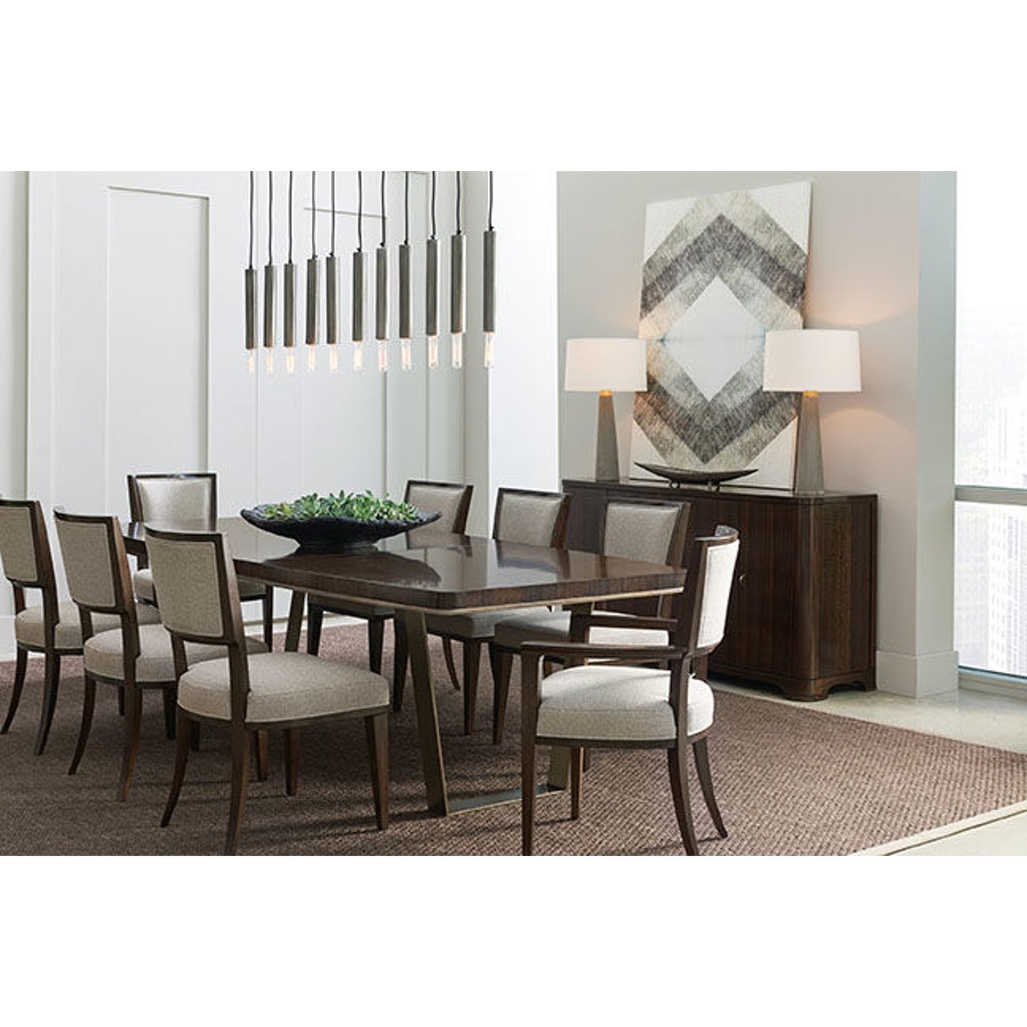 006 SR-769124 | Lifestyle | Streamline Dining Table by Caracole in bronze, smoked and aged bourbon, smoked bronze. Made from asian hardwood, fumed quartered figured eucalyptus, metal in a modern style.