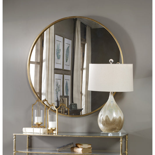 Junius Mirror by Uttermost in gold. Made from metal, mdf in a modern style.