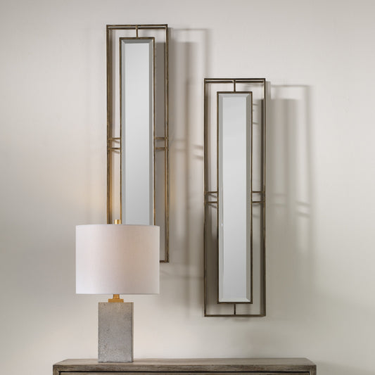 Rutledge Mirrors by Uttermost in gold. Made from metal 60% glass 40% in a transitional style.