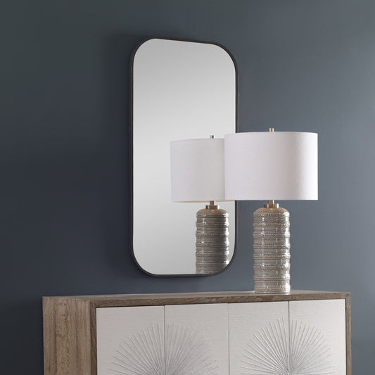 Taft Dark Mirror by Uttermost in bronze. Made from stainless steel, mdf, glass in a modern style.