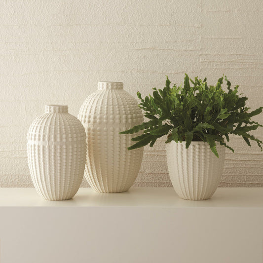 Nail Head Bowl by Global Views in rustic white. Made from ceramic in a coastal style.