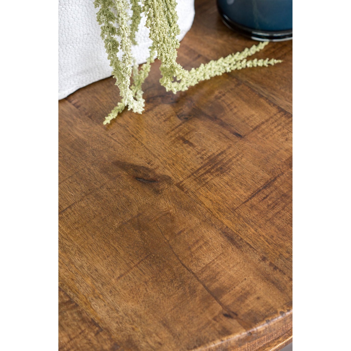 003 SR-897647 | Closeup | Bella Round Table by Kosas Home in honey brown. Made from mango wood in a traditional style.