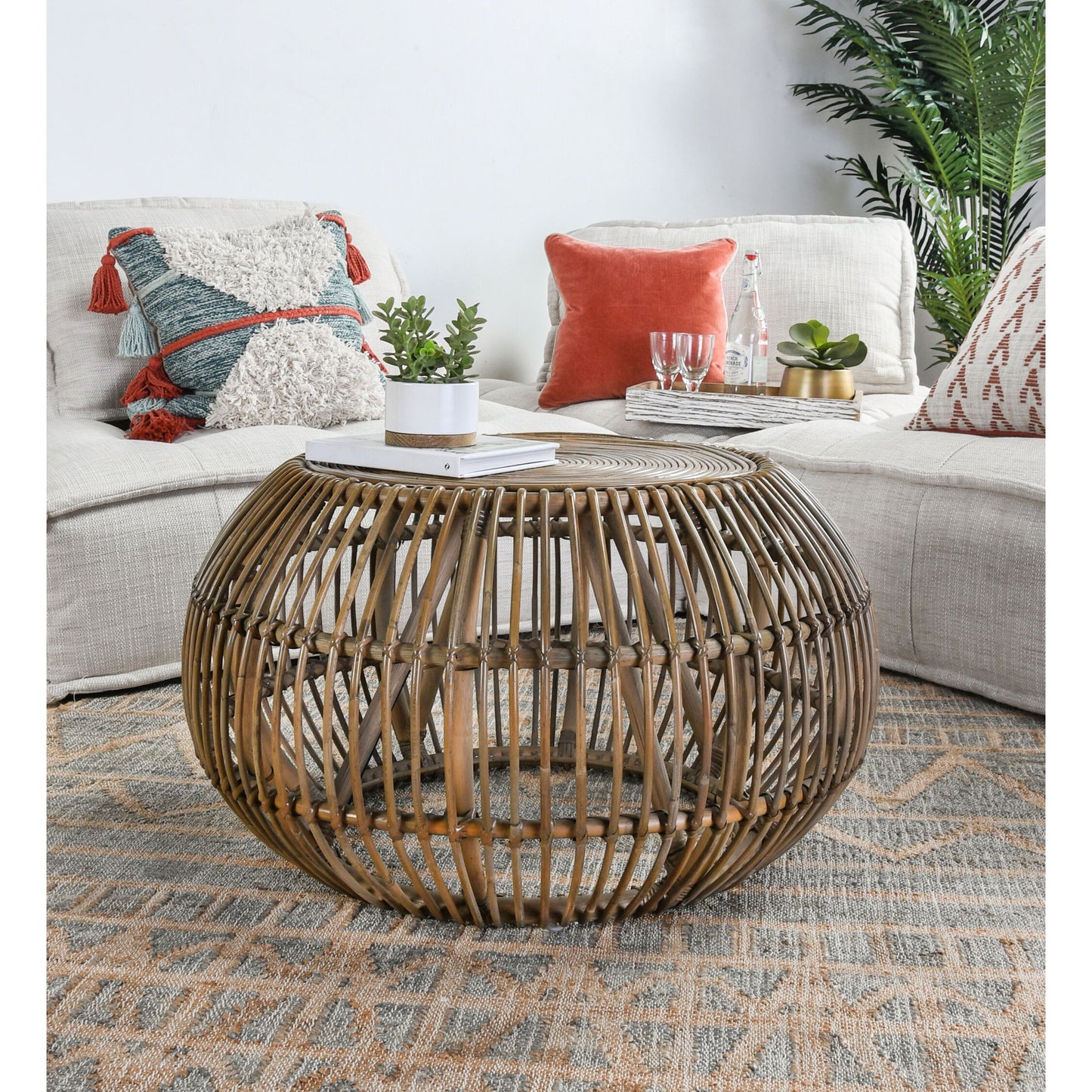 004 SR-897731 | Lifestyle | Lira Coffee Table by Kosas Home. Made from rattan subalio, jawit in a coastal style.