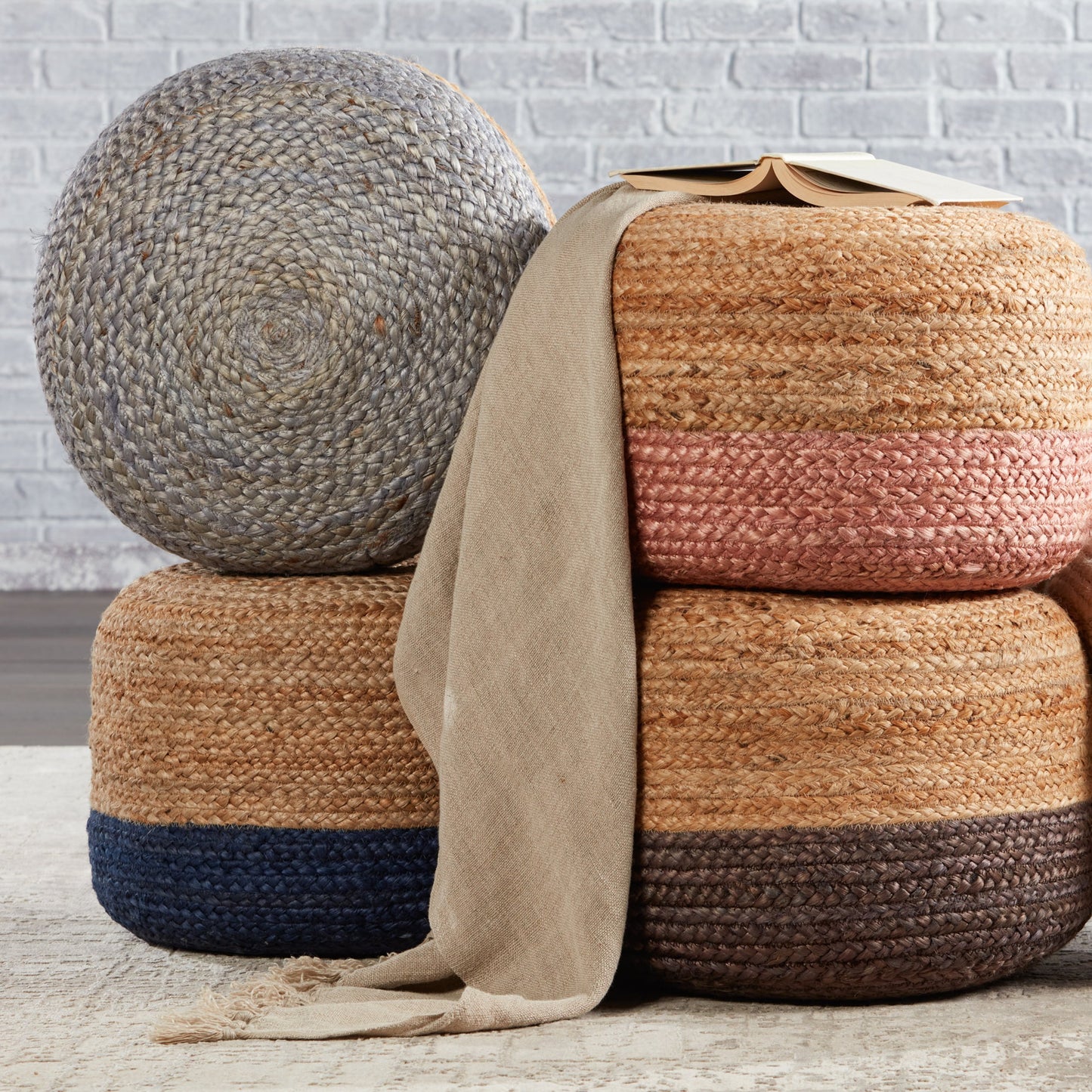 018 SR-816569,SR-816570 | Lifestyle | Saba Oliana Pouf by Jaipur Living. Made from 100% jute in a coastal style.