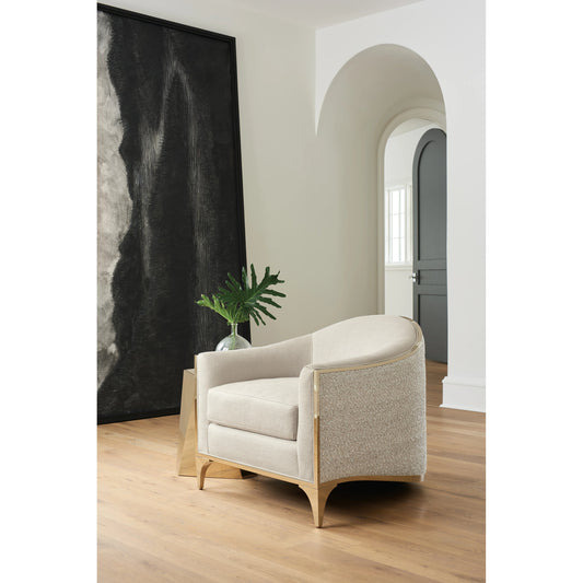 The Svelte Chair by Caracole in moonstone and majestic gold. Made from stainless steel in a modern style.