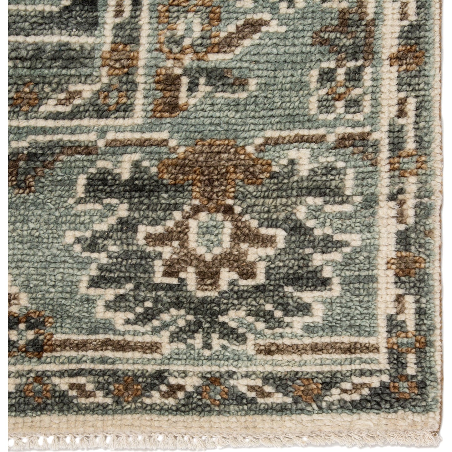 003 105534-42052,105534-42053,105534-45439 | Closeup | Salinas SLN11 Rug by Jaipur Living in light teal, ivory. Made from 100% wool in a unique style.