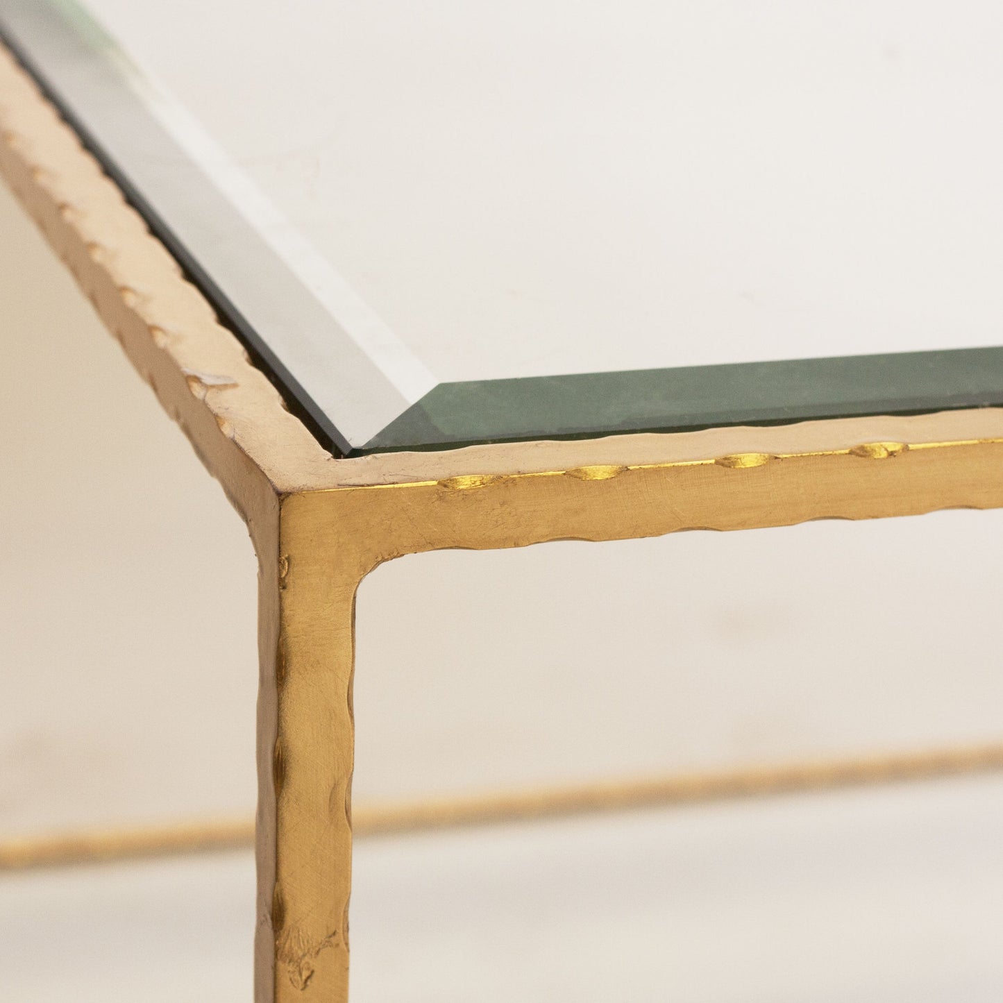 003 S-317072 | Closeup | Taylor Hammered Coffee Table by Worlds Away in gold. Made from metal, glass in a transitional style.