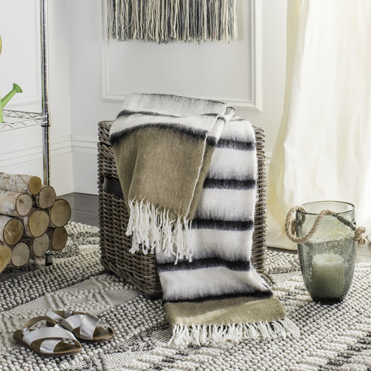 McAdoo Throw by HedgeApple Essentials in brown, white. Made from wool, acrylic, polyester in a eclectic & global style.
