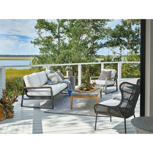 San Clemente Sofa by Coastal Living by Universal Furniture in stainless steel and grade a natural teak, carbon aluminum, brindle wicker. Made from unique in a modern style.