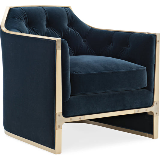 The Cat's Meow Tufted Chair by Caracole in midnight blue and warm silver. Made from birch in a modern style.