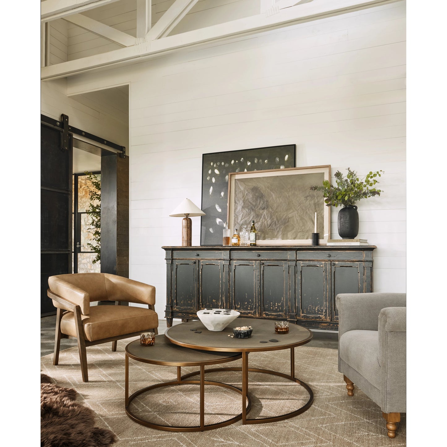 014 S-338940 | Lifestyle | Shagreen Nesting Coffee Table by Four Hands in antique brass, gray shagreen. Made from faux shagreen, iron, engineered hardwood in a transitional style.