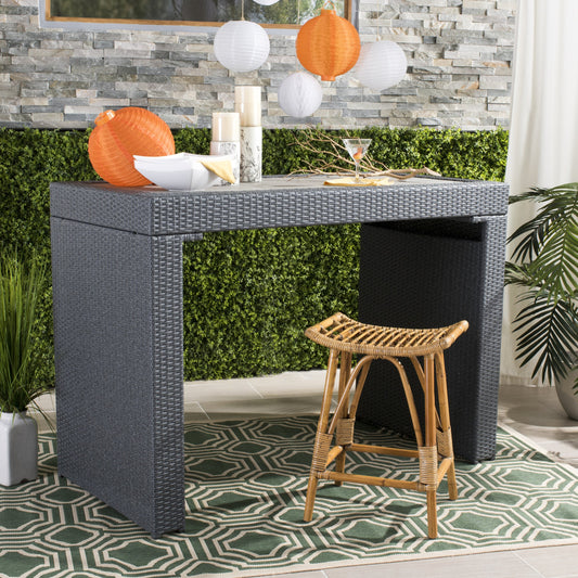 Coffey Rattan Counter Stool by HedgeApple Essentials in honey brown. Made from mindi in a coastal style.
