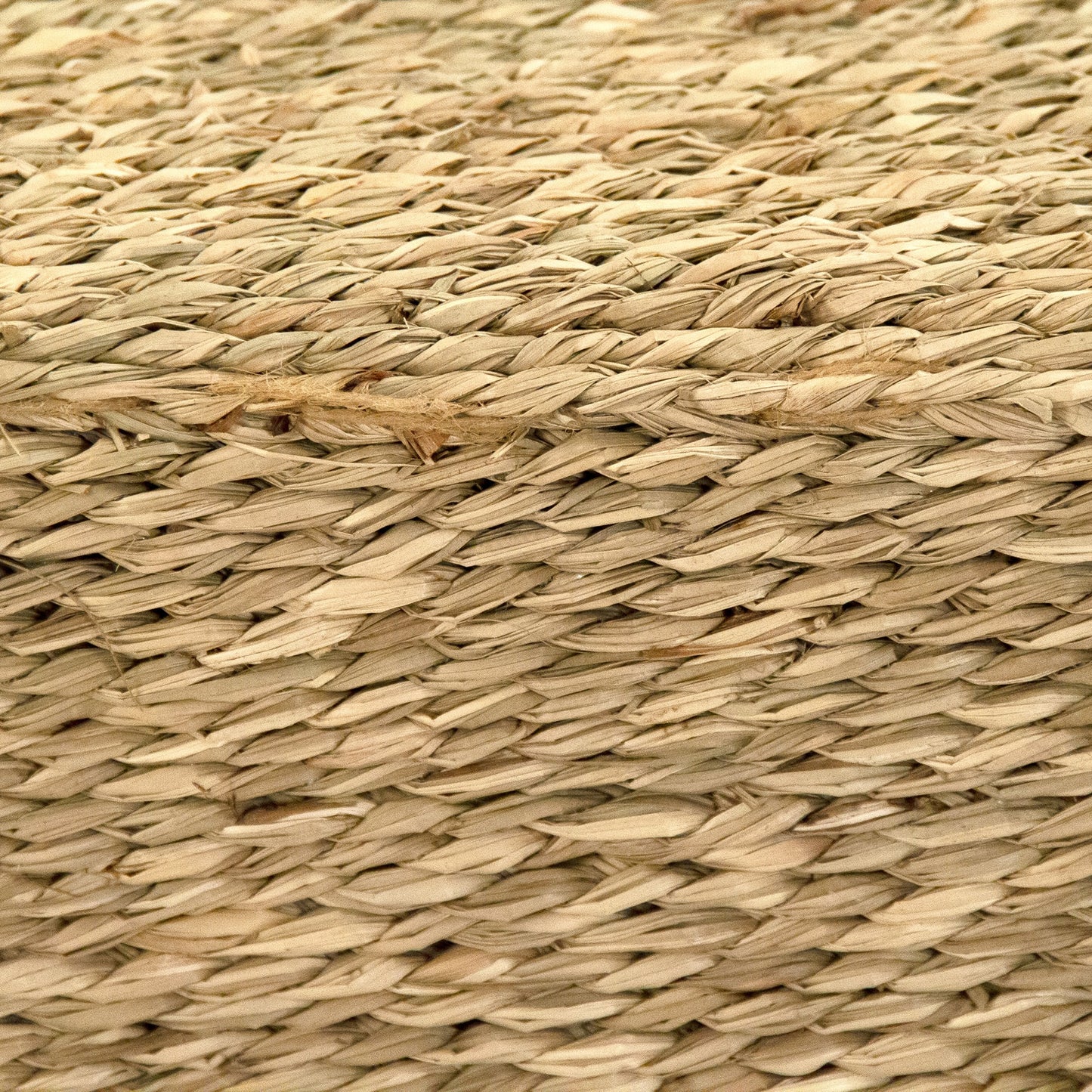 003 SR-900525 | Closeup | Woven Natural Seagrass Pouf by Zentique in natural. Made from seagrass in a coastal style.