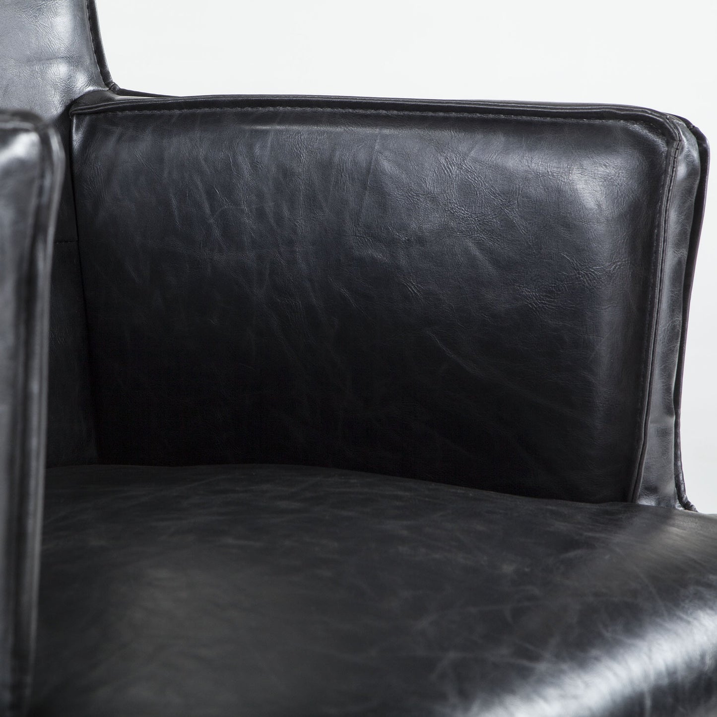 006 SR-876844 | Closeup | Avery Eco-Friendly Leather Accent Chair by World Interiors in black and napoleon. Made from birch wood, bi-cast leather in a modern style.