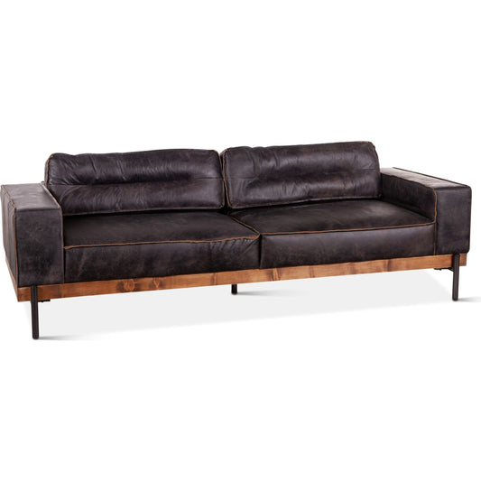 001 SR-876932 | Primary Silo | Chiavari Antique Leather Sofa by World Interiors in black and matte. Made from leather, foam, oak wood, iron in a modern style.