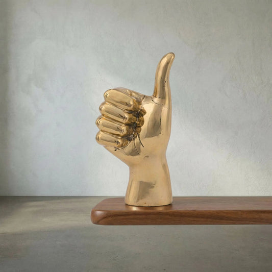Thumbs up by Noir in brass. Made from brass in a modern style.