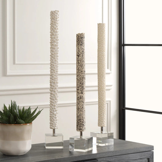 Makira Cylindrical Sculptures by Uttermost. Made from ceramic, crystal, iron in a eclectic & global style.