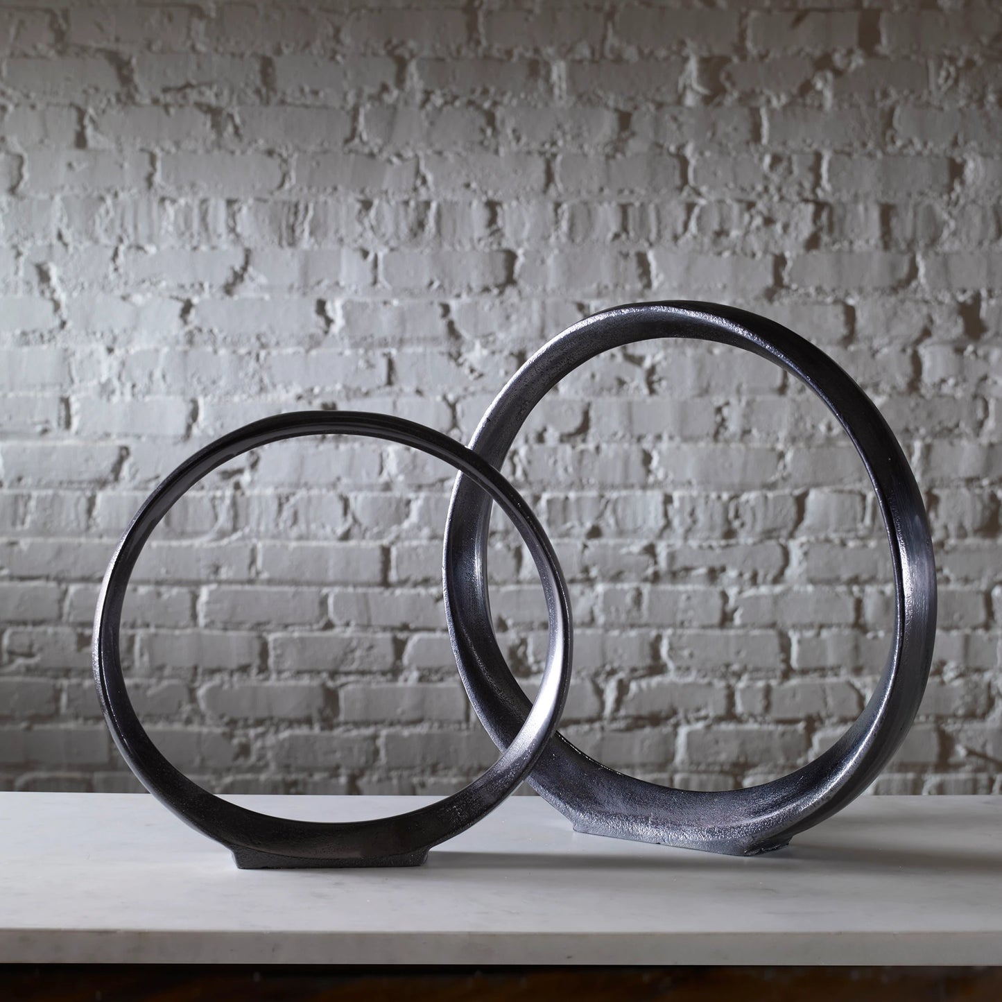 005 SR-897285 | Lifestyle | Orbits Ring Sculptures by Uttermost. Made from aluminum in a modern style.