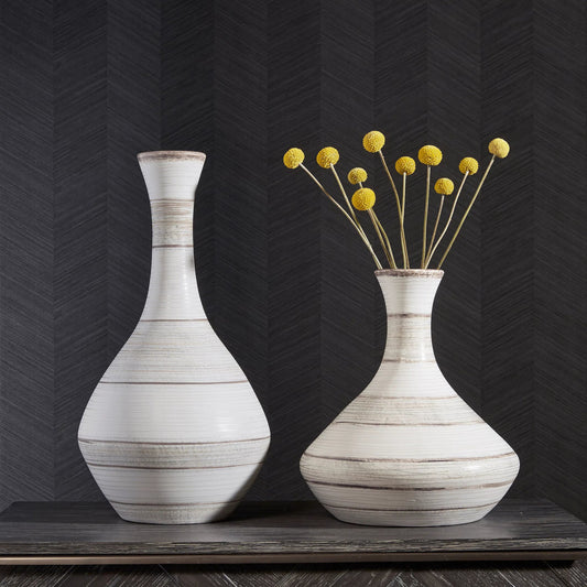 Potter Vases by Uttermost in ivory. Made from earthenware in a traditional style.