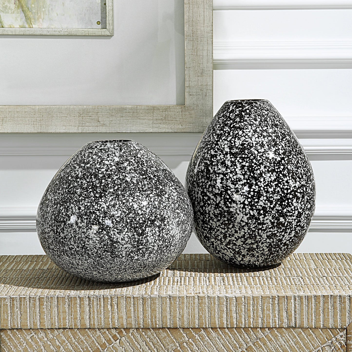 003 SI-2146817 | Lifestyle | Cosmic Vases by Uttermost in black. Made from ceramic in a modern style.